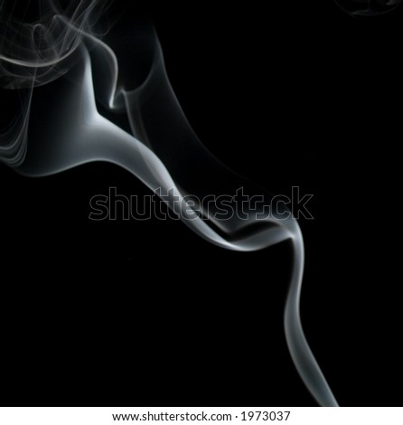 Smoke raises from an unknown source against a black background.