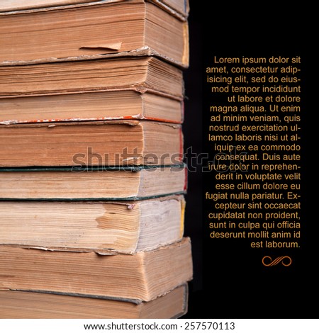 Decrepit old vintage book compiled in a row on a black background