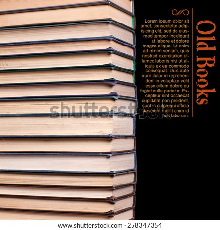 Decrepit old vintage book compiled in a row on a black background
