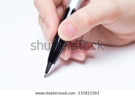female hand writing over white background