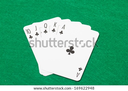 royal flush combination at poker on the green casino felt