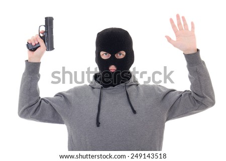 man in black mask with gun holding hands up isolated on white background
