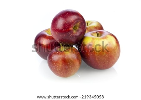 five apples on white