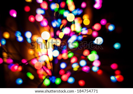 Colorful light bulbs and vivid round bokeh lights tree festive mood lightning