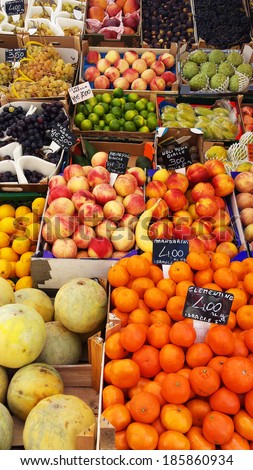 Beautiful colorful ripened juicy fresh mediterranean fruits on an italian marketplace, background image