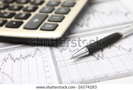 business graph, calculator & pen