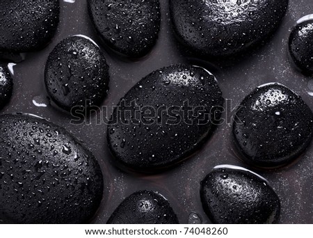 black stones with water drops