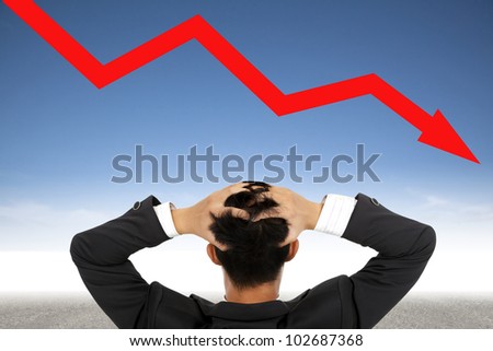 depression businessman watching  falling financial line