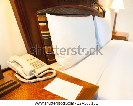 blank notice paper on the table of hotel room