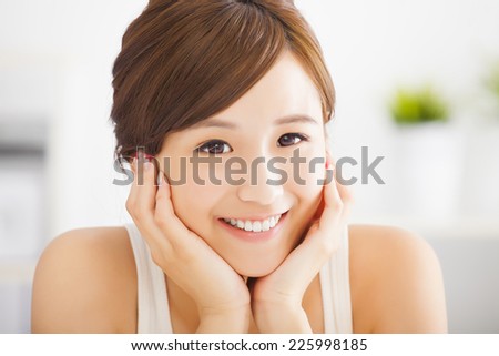 beautiful and smiling  asian young woman