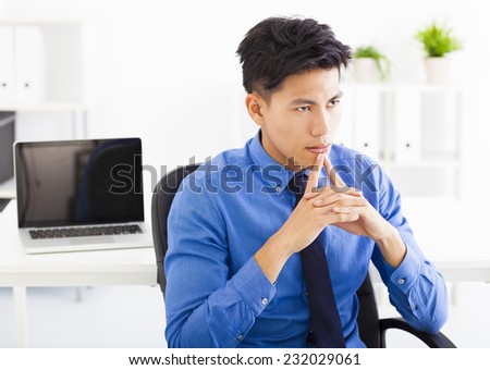 Young asian businessman  thinking plan in the office