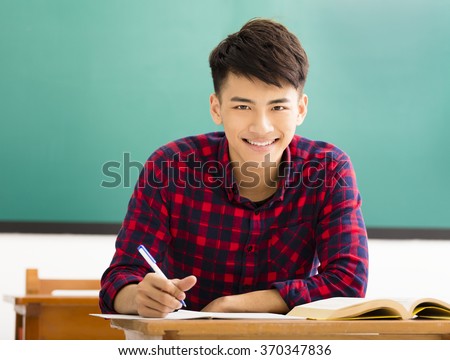 smiling  college student study in university classroom
