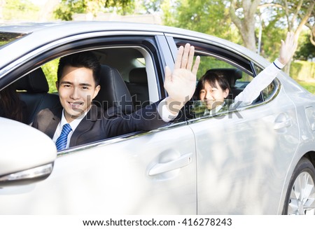 business man with daughter driving car go to work and school