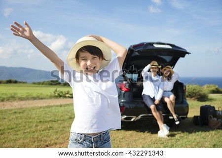 happy Family with little girl travel by car