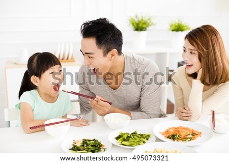 happy asian young Family enjoy their lunch