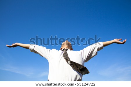 free and relax of businessman under blue sky