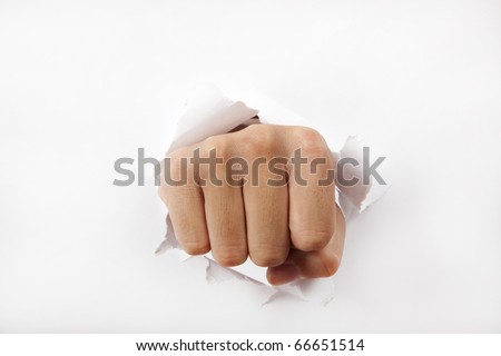 Man fist break through the white paper