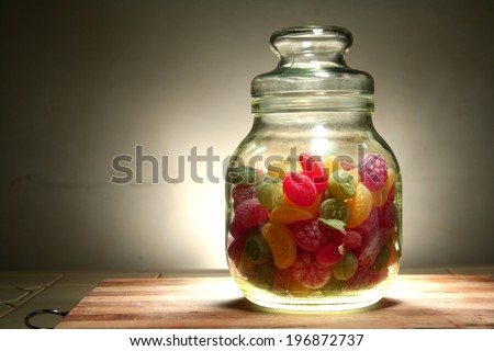 Colorful Hard candies in a jar Photo of colorful hard candies in a jar