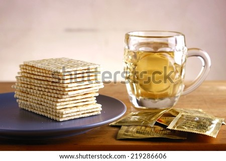 Soda Crackers and a cup of tea Photo of a stack of soda crackers and a cup of tea