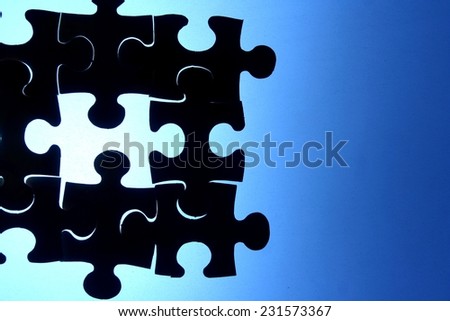 Puzzle with a missing piece Photo of a puzzle with one missing piece