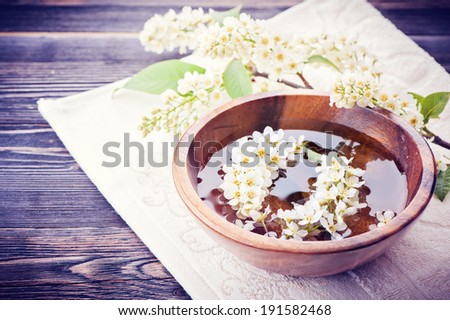 Spa. Flowers in bowl of water for the spa salon