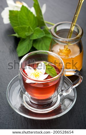 Herbal tea with mint, jasmine and honey.