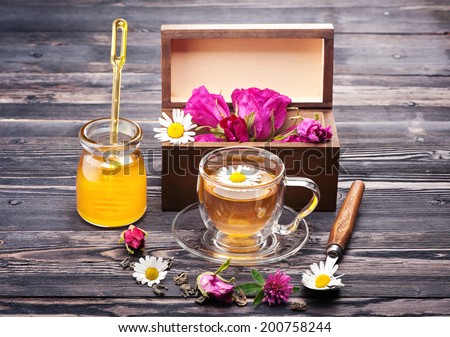 Herbal tea with honey and flowers. Wild herbs and flowers.