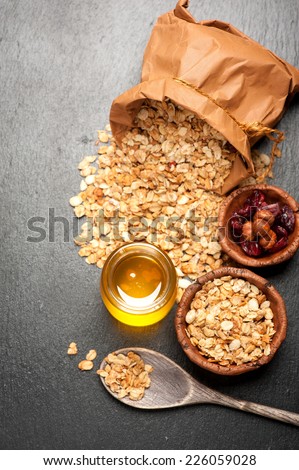 Healthy breakfast with muesli and honey. fitness diet