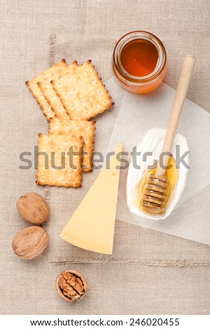 Parmesan cheese, honey, cookies and nuts