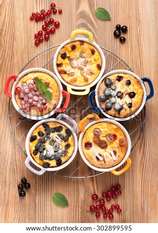 Cottage cheese casserole Cheesecake with with summer berries. cheese pudding. top view