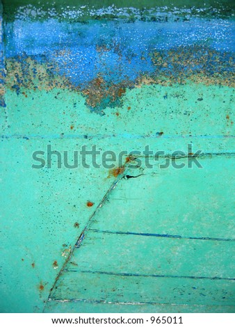 Peeling paint on steel boat hull #4
