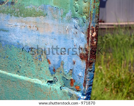 Peeling paint on steel boat hull #11