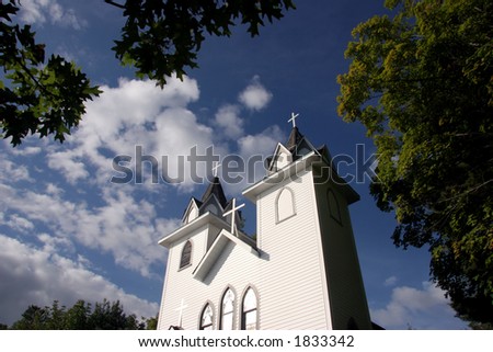 Spires of a white church in the clouds