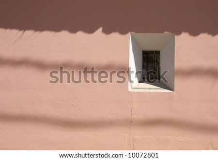 Shadow on a pink building