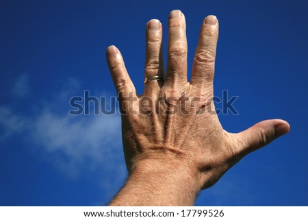 Man's left hand