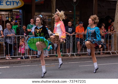 BRISBANE, QUEENSLAND/AUSTRALIA - MARCH 12: Irish dancers performing on the annual St. Patrick\'s day parade on March 12, 2011 in Elizabeth Street, Brisbane.