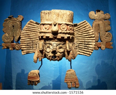 Golden mask in museum of Tenochtitlan.