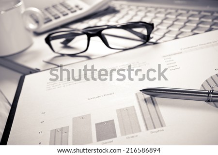financial charts and graphs on the table,Office working area