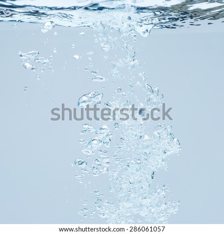 Closeup of blue bubbles underwater