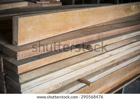 Stacked wood pine timber production for processing and furniture production at woodworking enterprise,door industrial factory.