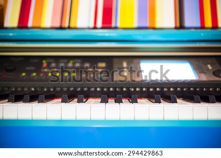 Colorful Piano keyboard background with selective focus