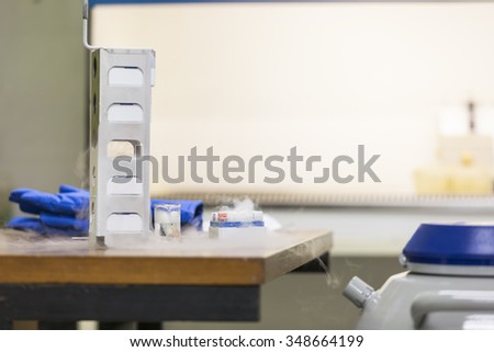 scientist working at the laboratory,working with liquid nitrogen