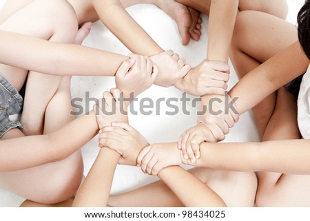 asian children\'s hands on a white background