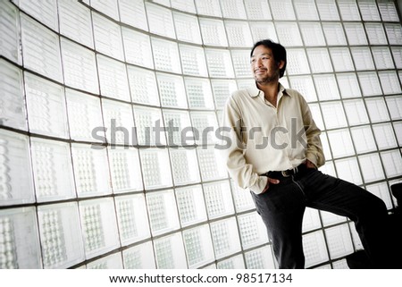 Portrait of a businessman looking at the window