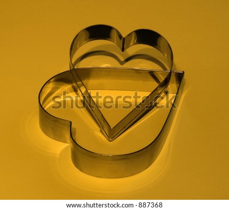 heart shapes (pastry cutters) with a  deep yellow hue