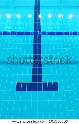 Detail from indoor swimming pool, water and lines