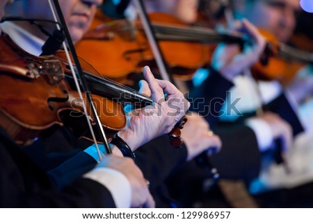 Violin Players Close Up During A Classical Concert Music