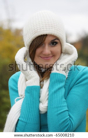 cute young women in white hat and gloves sweet smiling