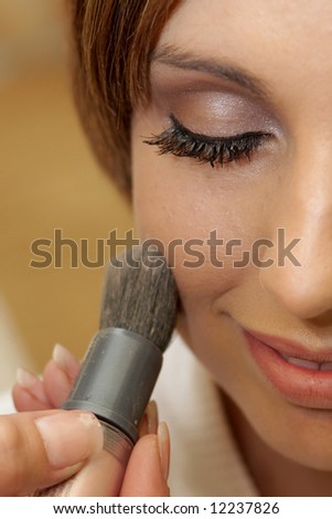 A bride getting her makeup done