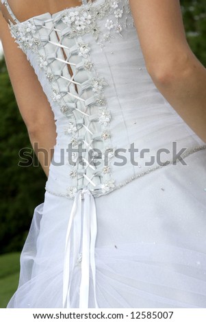 The back of a brides wedding dress